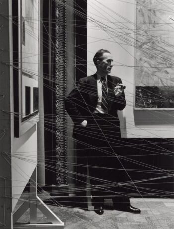 Marcel Duchamp [1942] Behind Mile of String. First Papers of Surrealism, New York. Photo by Arnold Newman.