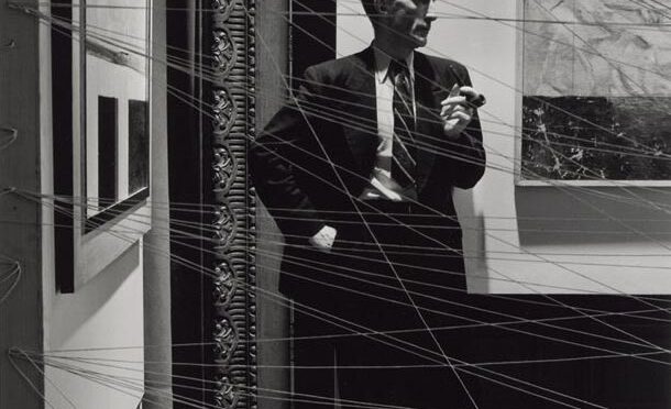 Marcel Duchamp [1942] Behind Mile of String. First Papers of Surrealism, New York. Photo by Arnold Newman.