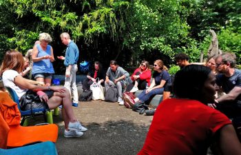 Group discussion on art and gentrification in the Old Tidemill Garden, Reginald Road. Photo by Ruth Gilburt.