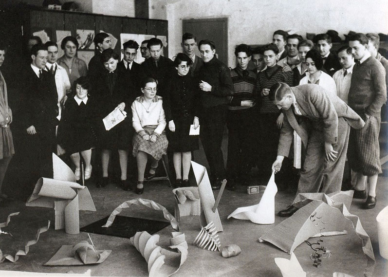 Josef Albers Preliminary class group critique. Bauhaus Dessau, 1928-29. Photo by Otto Umbehr.